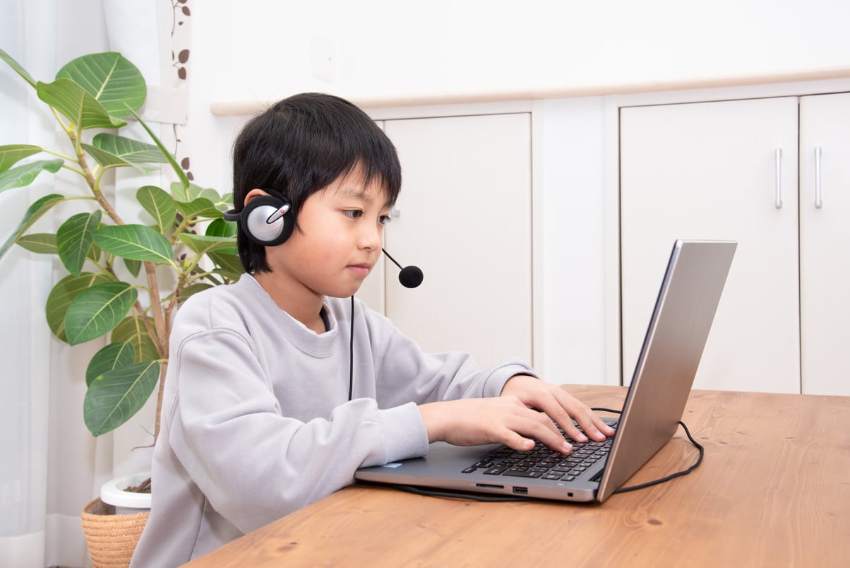 Japanese boy taking online lessons